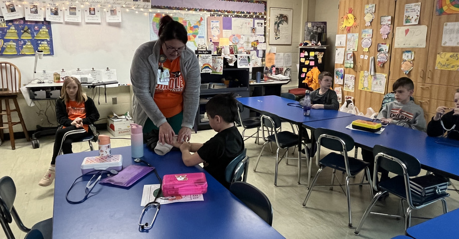 Students learn what it's like to be a nurse on career day